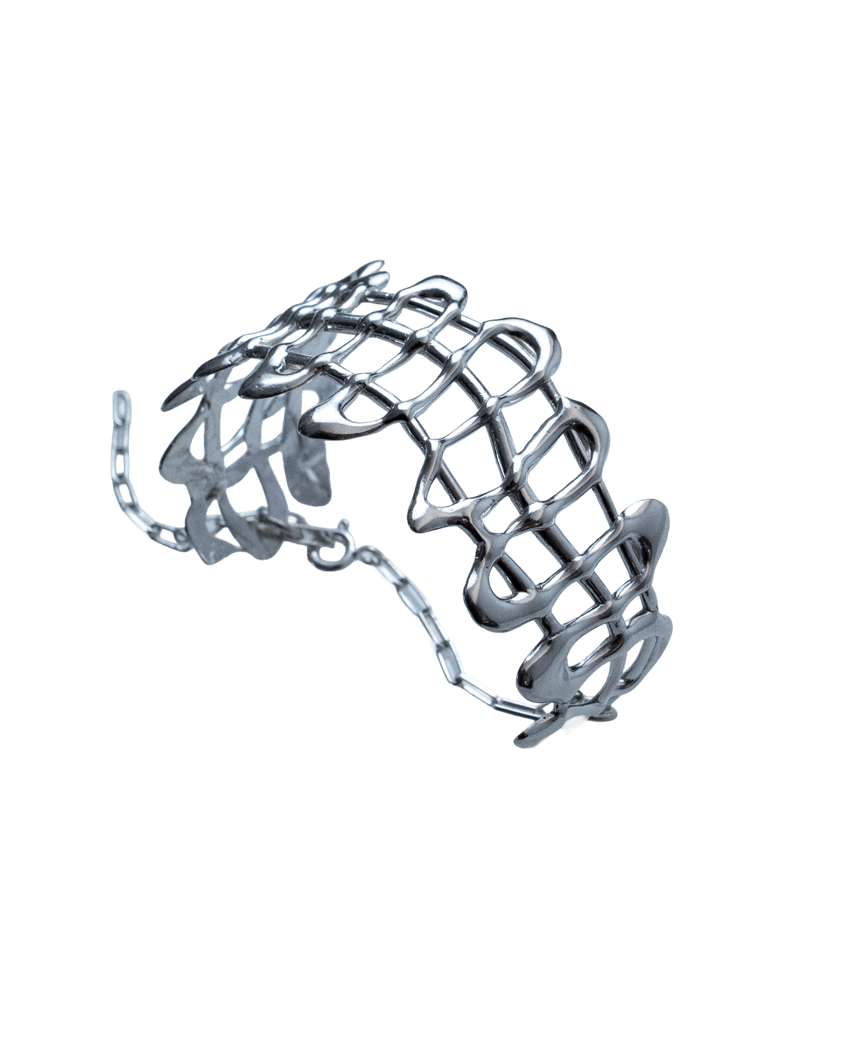 Close-up of the curved openwork form of the With a Bang sterling silver bangle