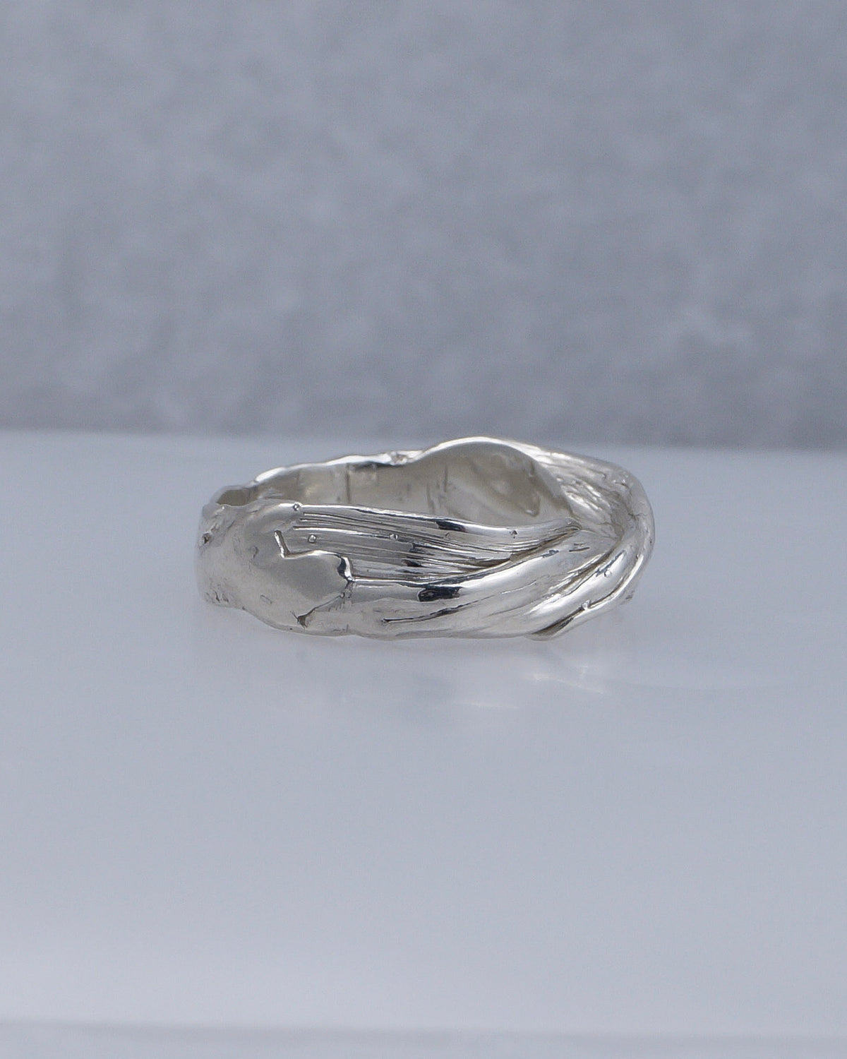 Back view showing the organic texture of the Fold 006 sterling silver ring