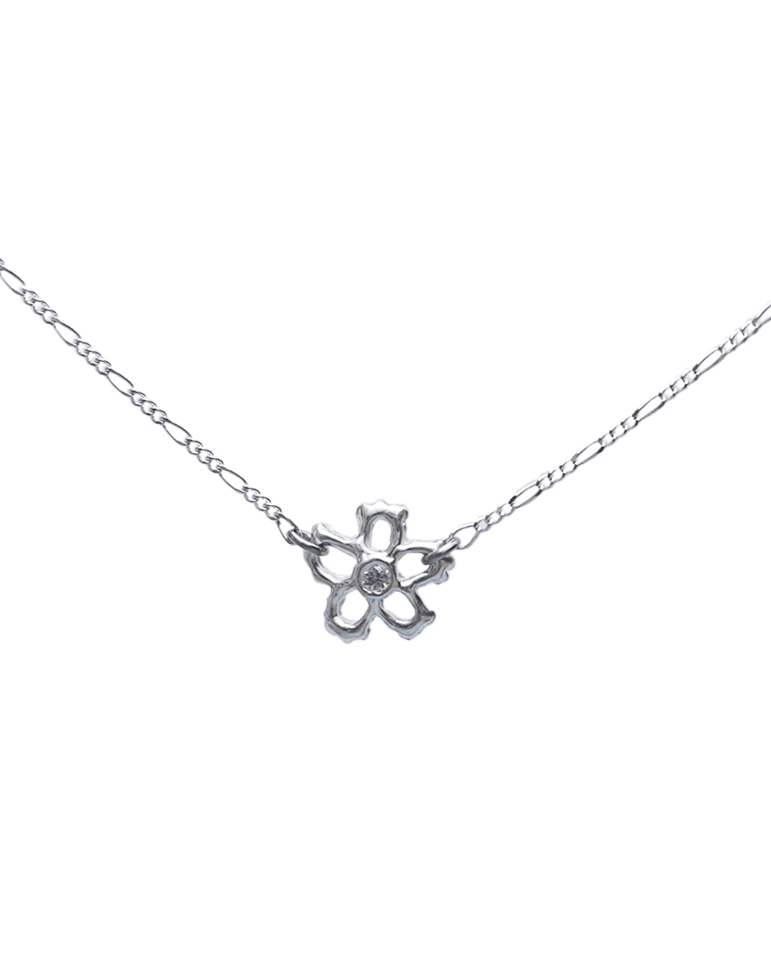 Sculptural silver flower pendant on a Figaro chain