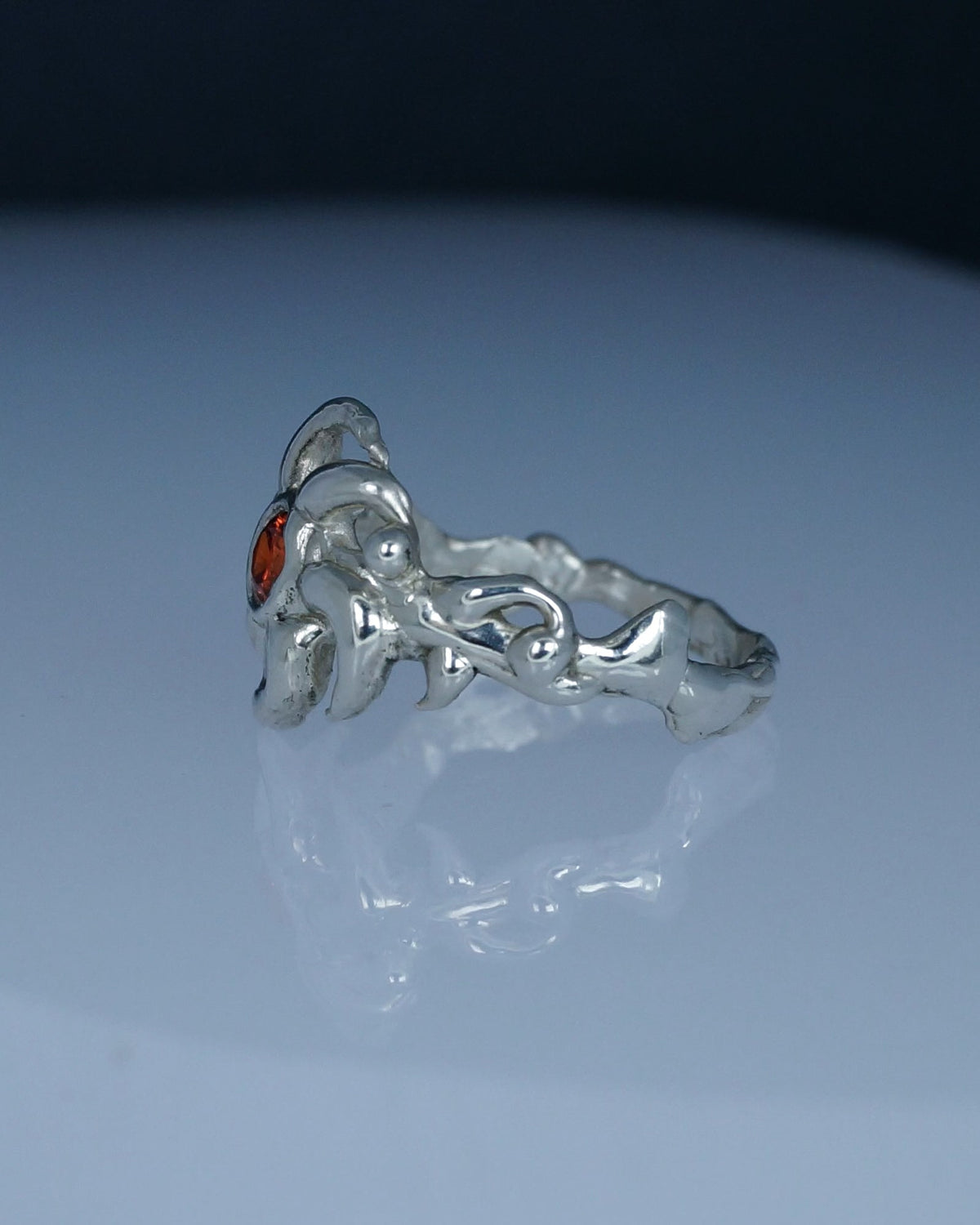 Close-up of the sculptural sterling silver Sunnie Ring
