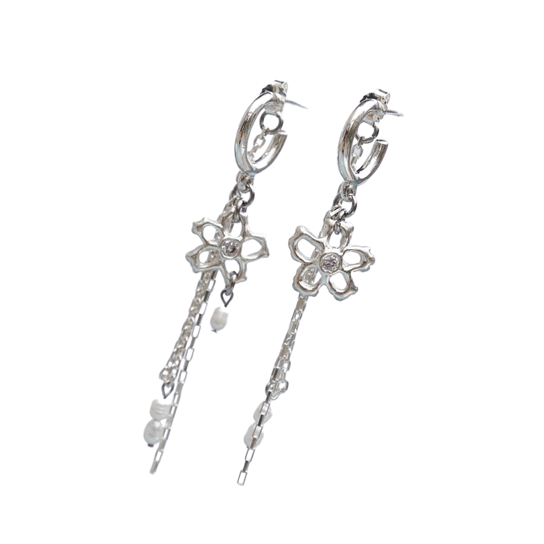 Side view of Lazy Daisies flower and chain earrings