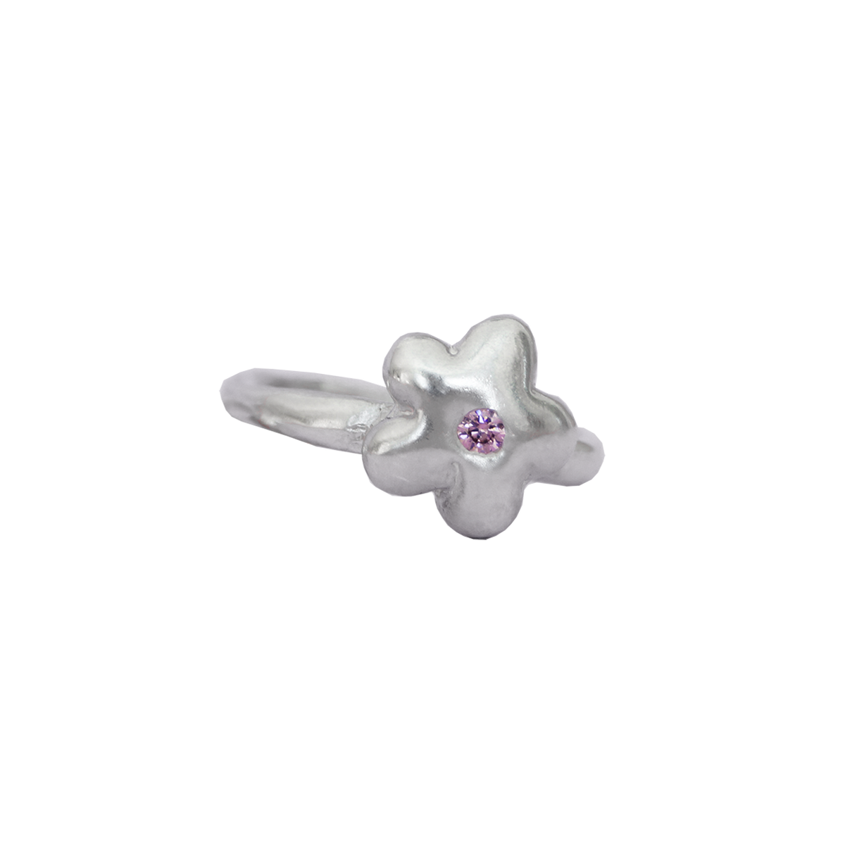 Sculptural sterling silver flower ring with a pink gemstone