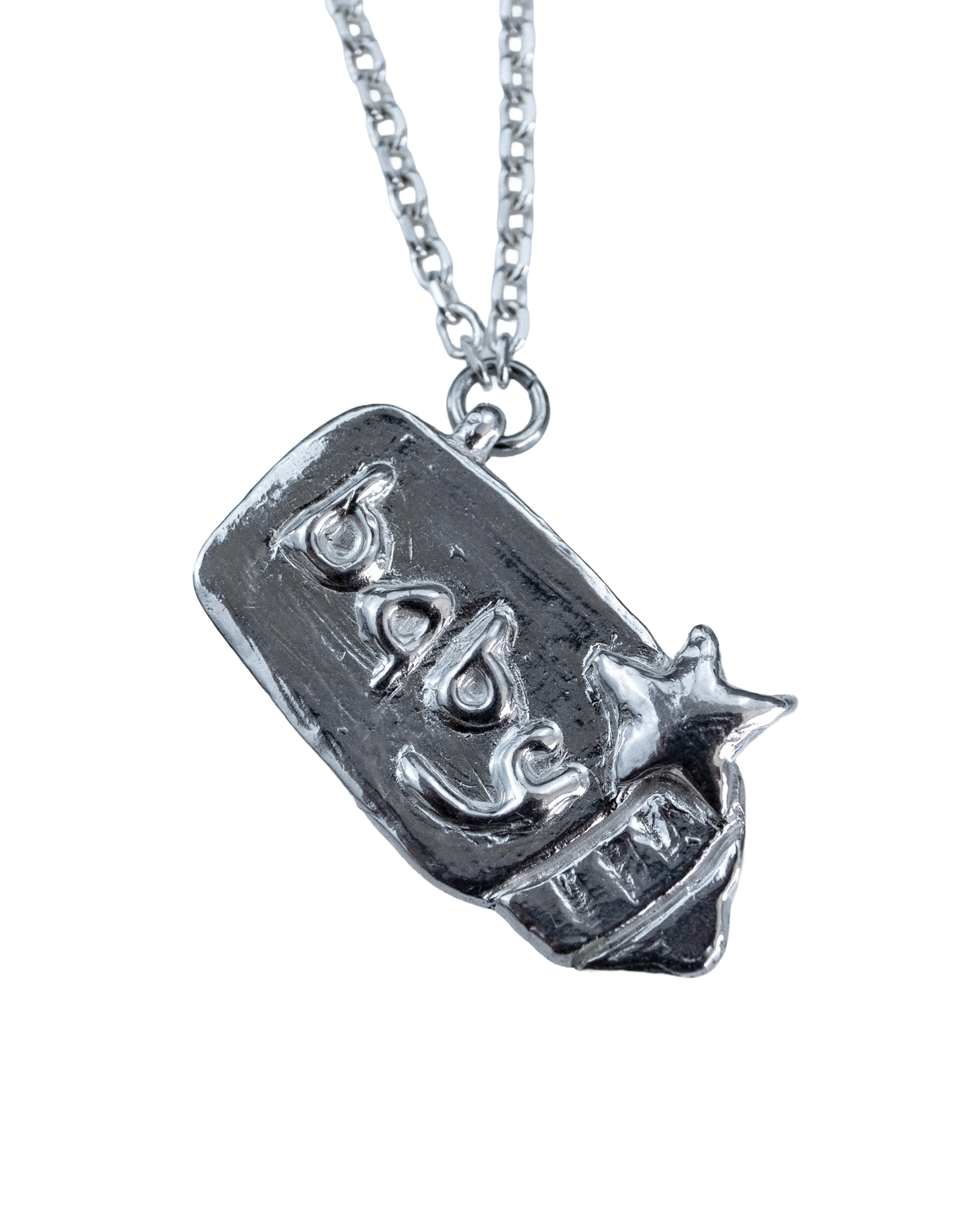 Close-up of the Big Baby sterling silver bottle pendant with raised BABY lettering and star