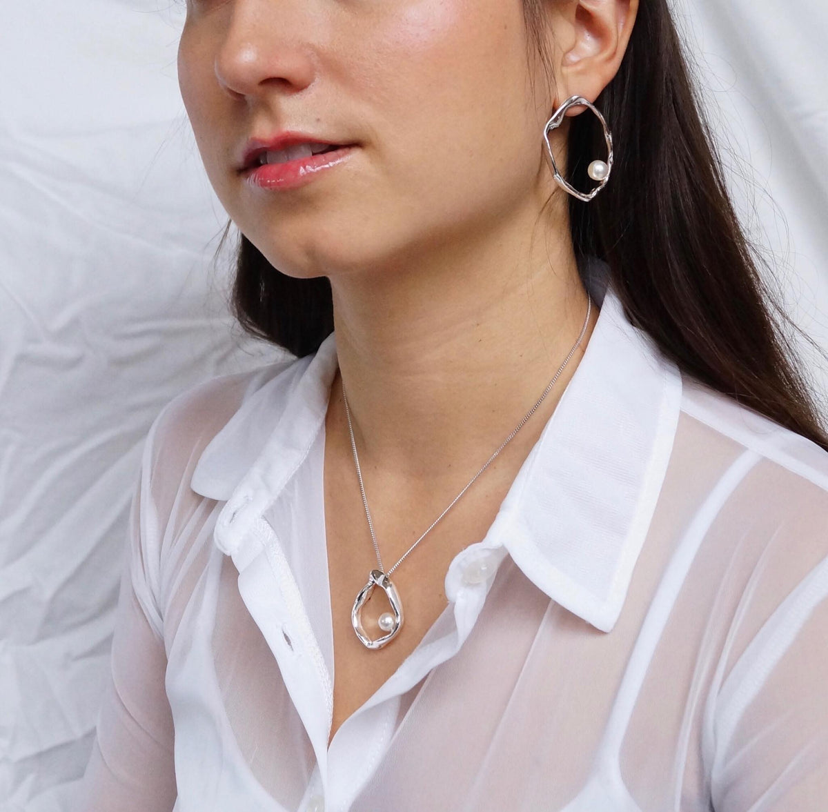 Model wearing Mother sterling silver pearl pendant necklace