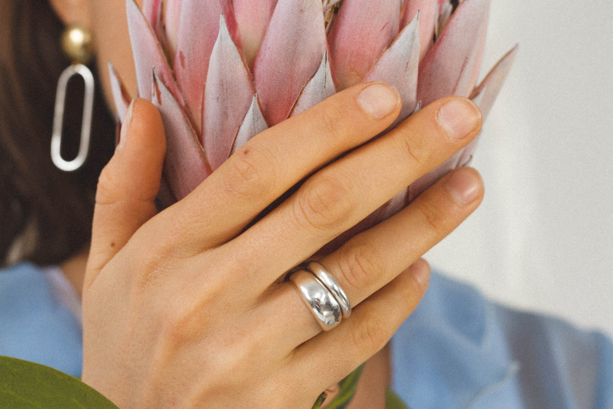 Sunday Feel Thick Blob Ring styled with other silver rings